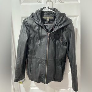 Kenneth Cole women’s 100% leather jacket with hood, size M, has flaw shoulder